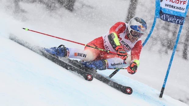 Olympic ski champ Marco Odermatt wins weather-affected GS