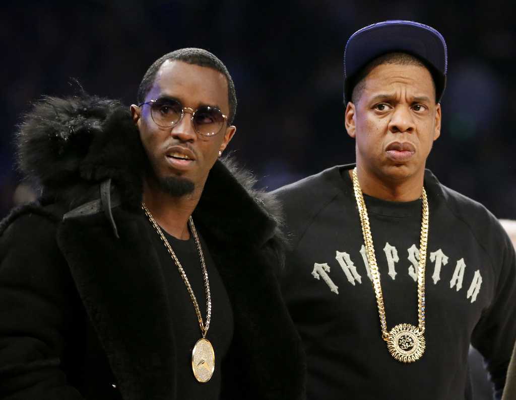 A federal judge says an Alabama woman accusing Jay-Z and Sean "Diddy" Combs of raping her when she was 13 years old can proceed anonymously for now with her lawsuit against the music moguls