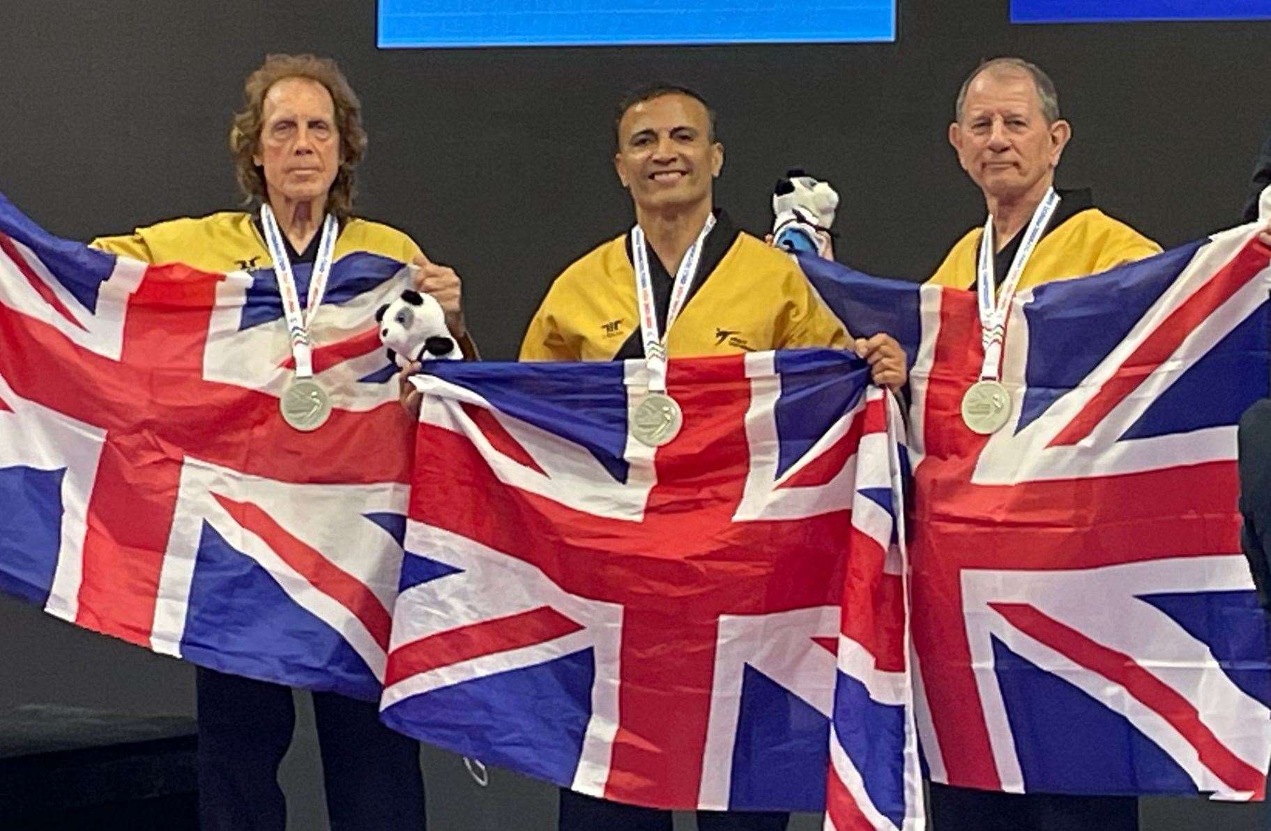 Ashford’s Colin Larkin joins forces with Ali Pourtaheri and Mike Pejic to win team silver in over-60s’ category at World Taekwondo Championships in Hong Kong