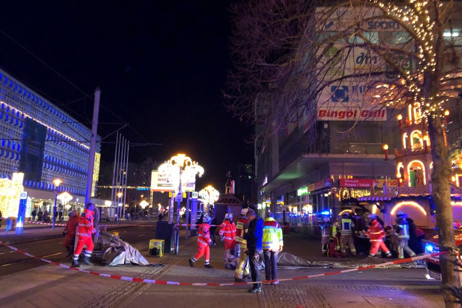 At least 2 dead and 60 hurt after a car drives into a German Christmas market in a suspected attack