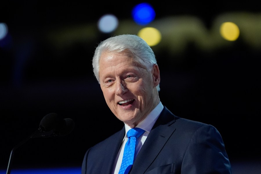 Bill Clinton is hospitalized with a fever but in good spirits, spokesperson says