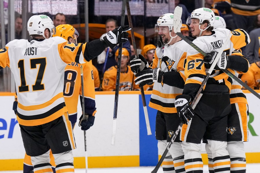 Rust scores OT winner to lead Penguins over Predators