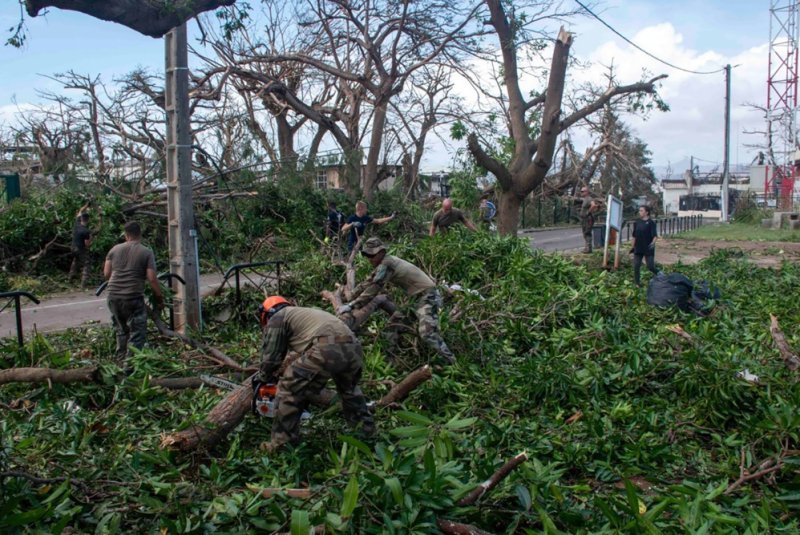 Macron tours Mayotte cyclone damage as officials fear huge death toll