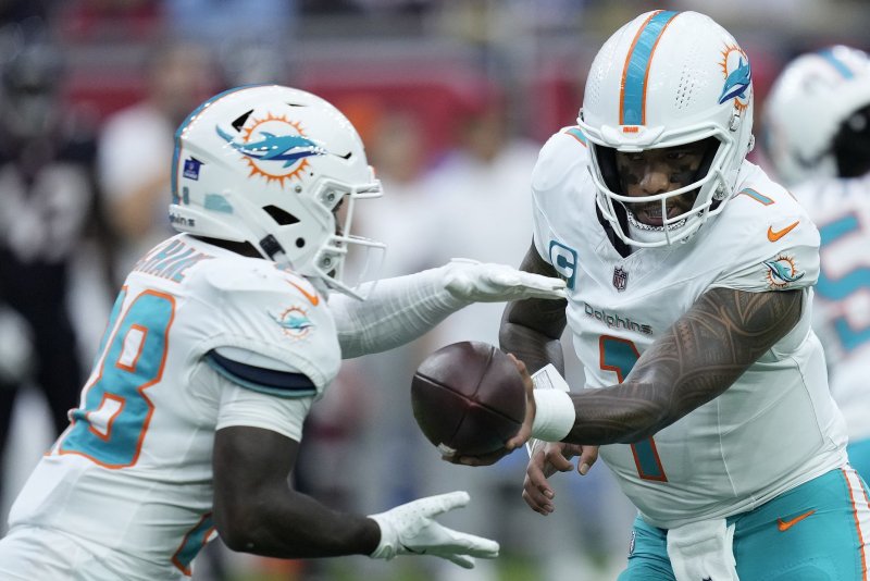 Miami Dolphins defeat San Francisco 49ers, keep slim playoff hopes alive