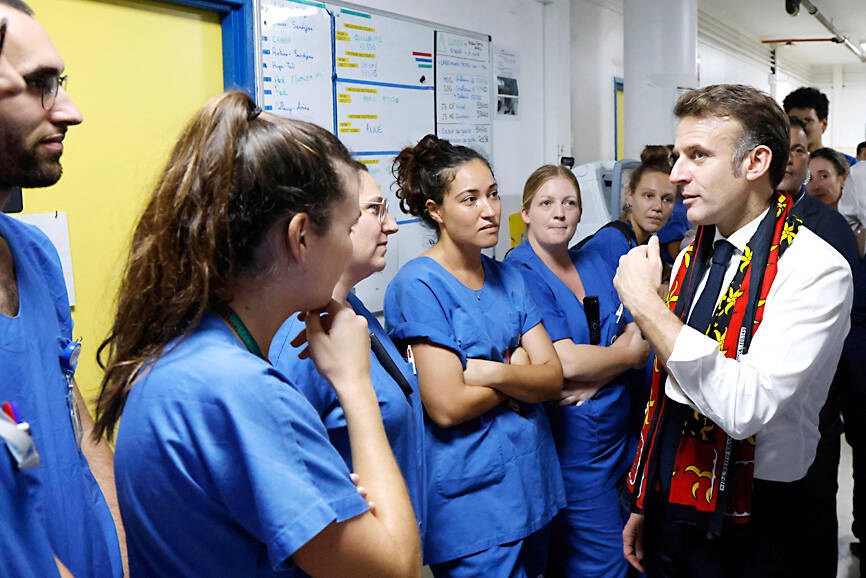 Macron arrives in cyclone-hit Mayotte