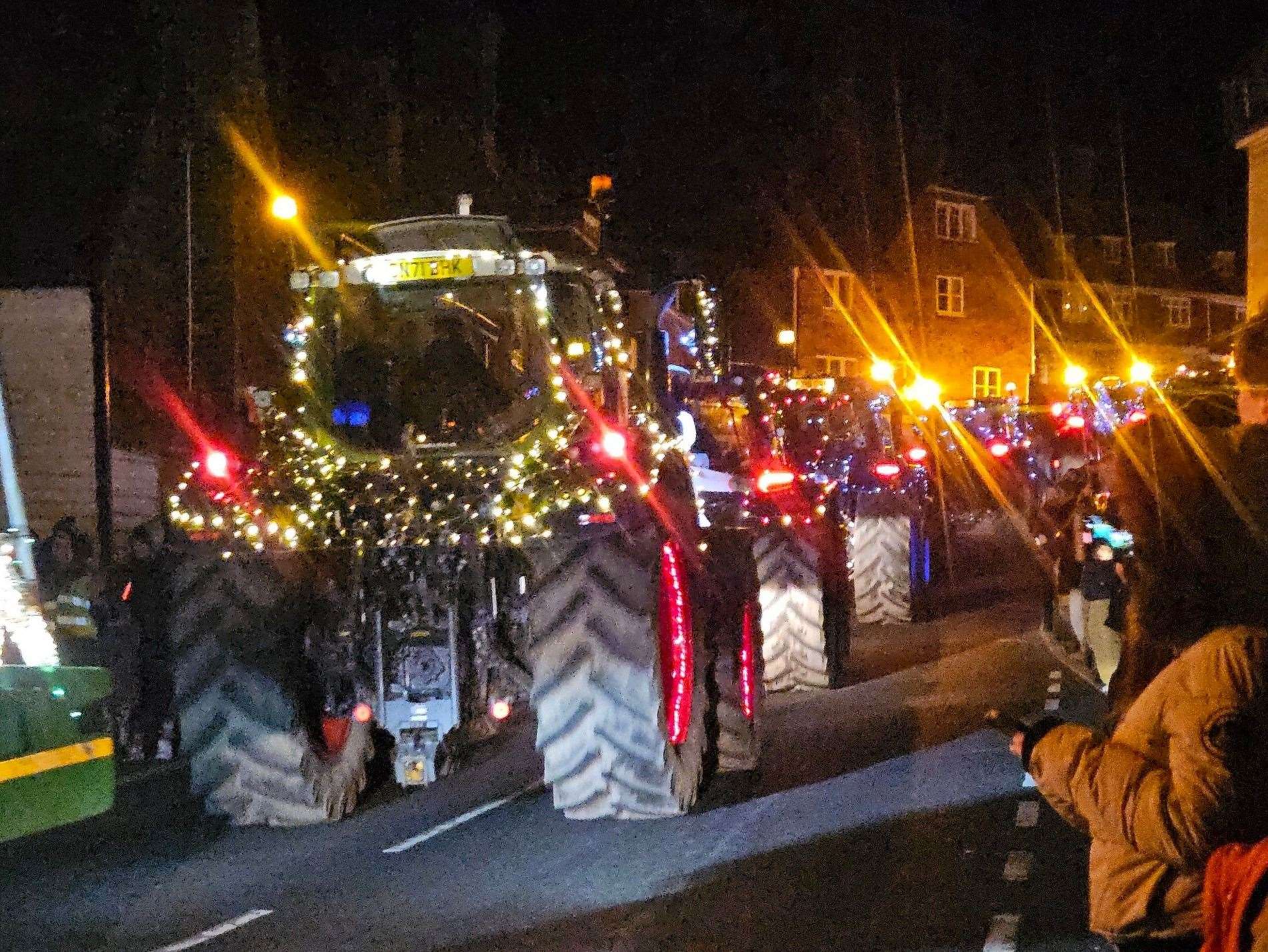 Crowds cheer on farmers in Weald Christmas tractor parade 2024