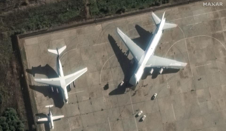 Russia looks to be packing up its helicopters and air defenses at its base in Syria, new satellite images show