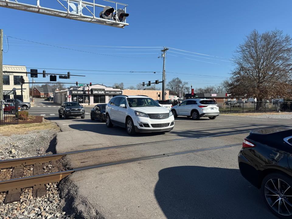 Depot District pedestrians will gain sidewalks crossing railroad: 'We walked through mulch'