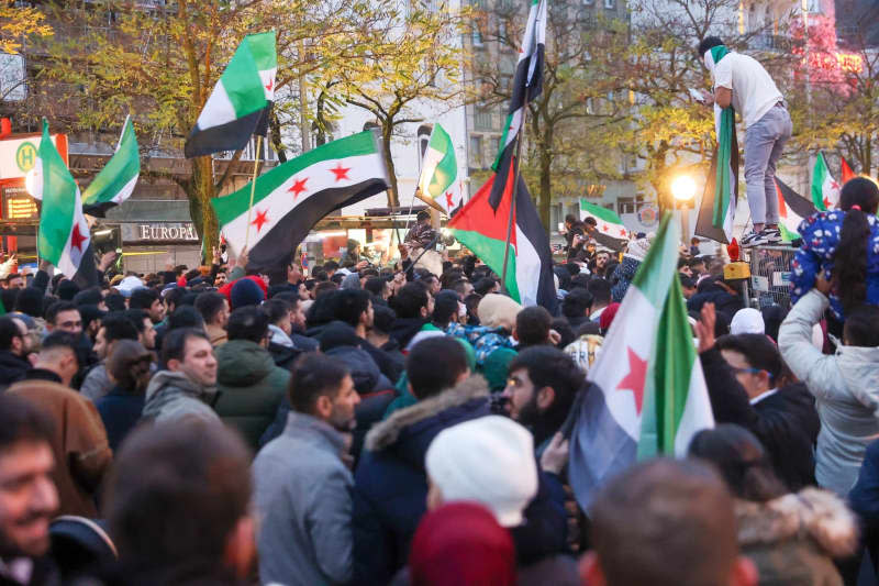 Syrians across Germany rejoice at demise of despised leader al-Assad