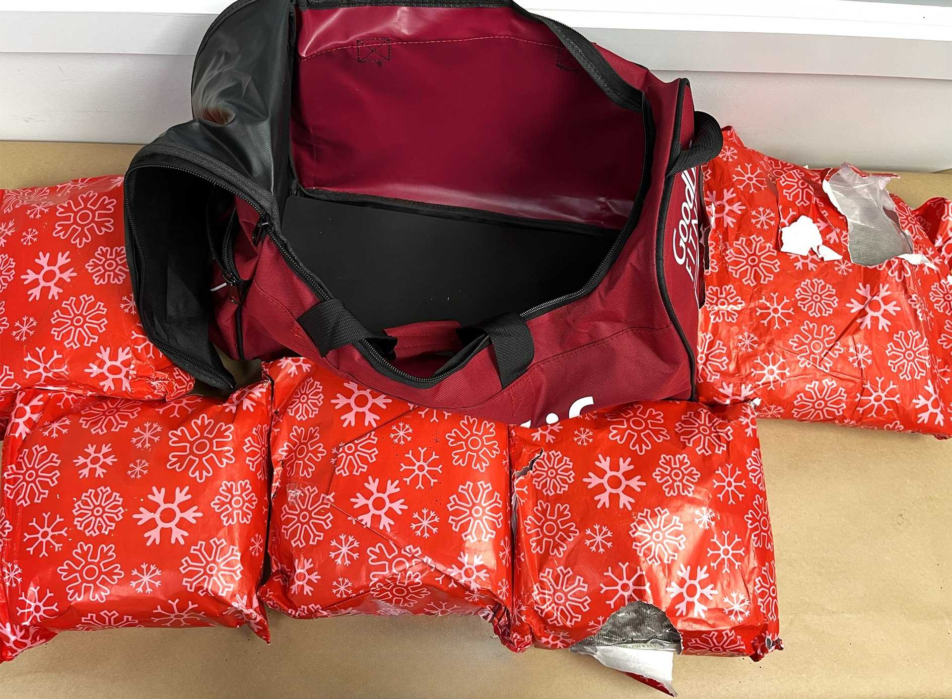 Woman arrested with 22 pounds of meth wrapped as Christmas presents at New Zealand airport