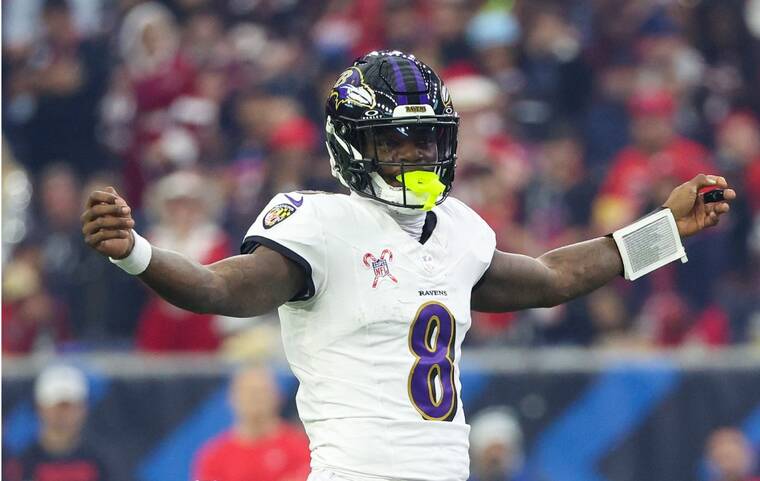 Lamar Jackson sets NFL QB rushing record, eclipsing Michael Vick