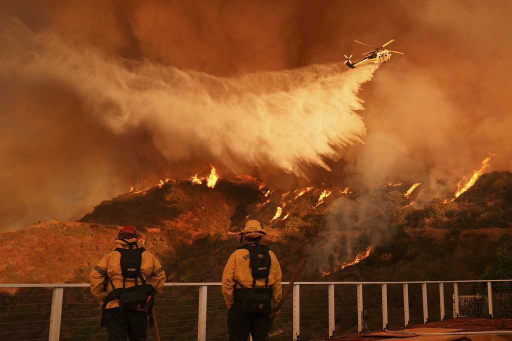 Los Angeles wildfires death toll rises as crews fight heavy winds