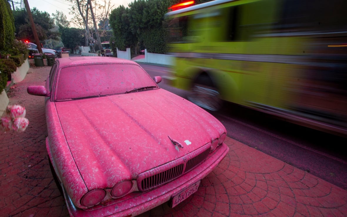 What is the pink powder fire crews are dropping on L.A., and how does it work?