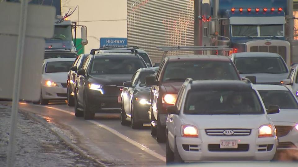 2 people hospitalized, Route 1A in East Boston closed after charter bus topples utility poles