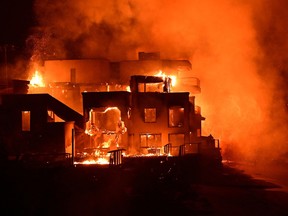 More details emerge of destruction in Los Angeles as wildfire surges