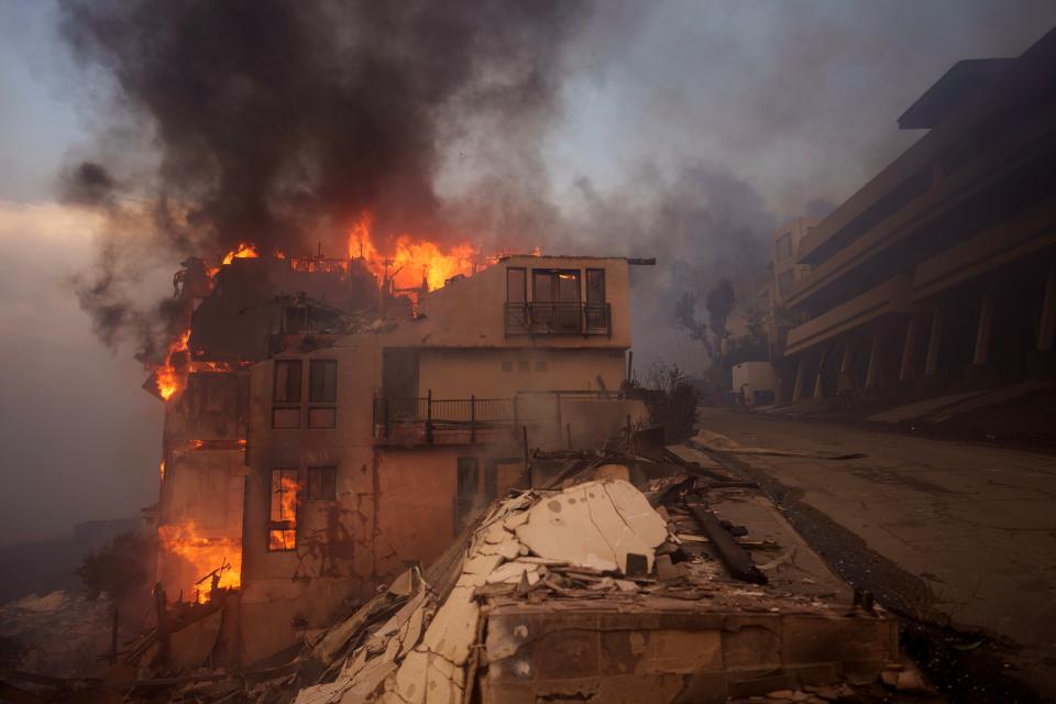 Photos capture destruction and firefighters' heroic efforts