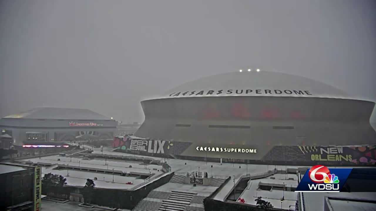 Snow puts temporary freeze on some last-minute Super Bowl preps