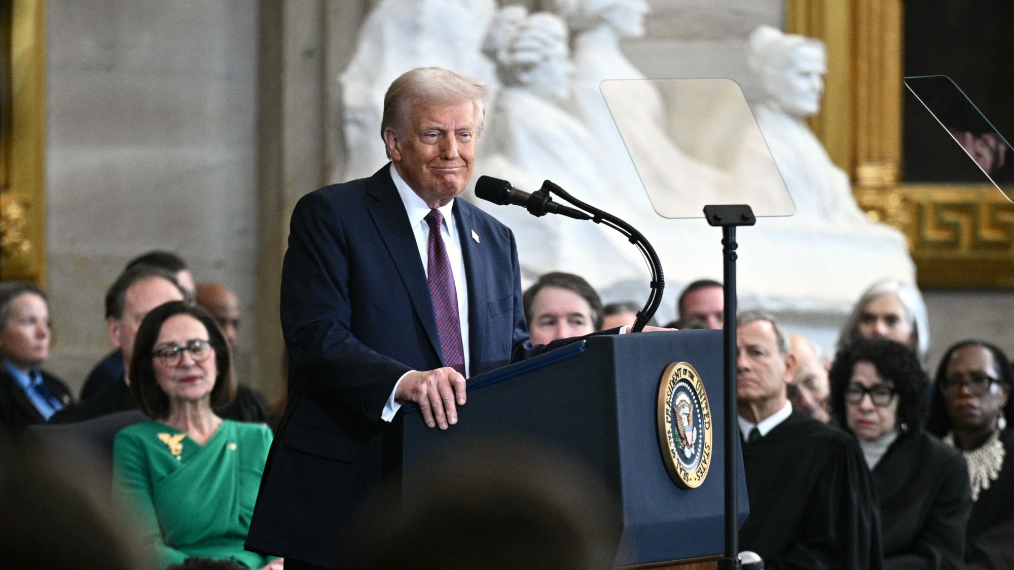 Trump declares 'golden age' at indoor inauguration