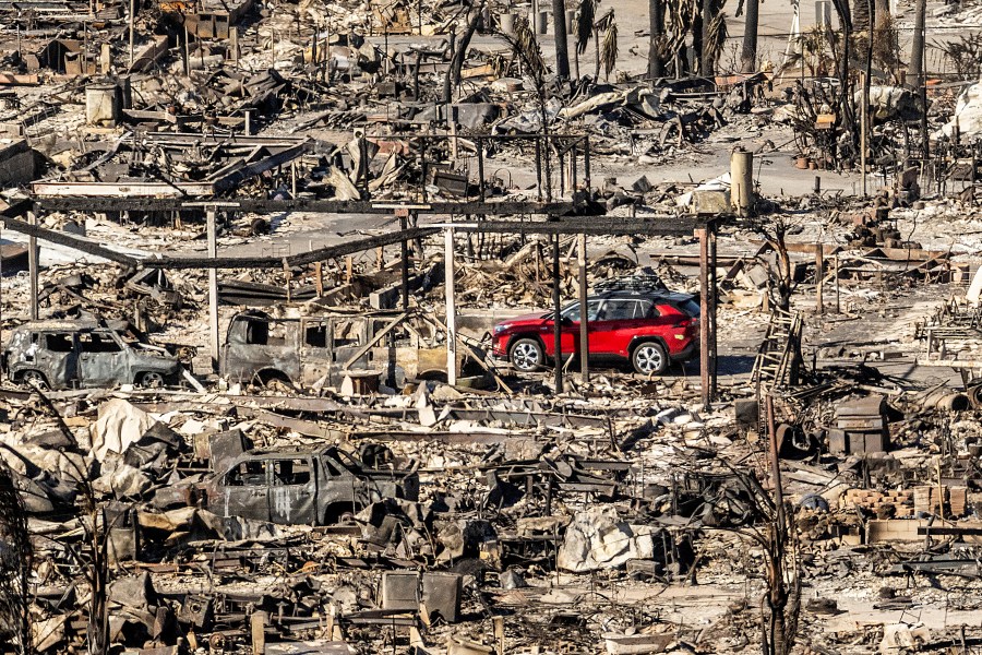 Wildfire death toll surges to 24 as firefighters brace for more fierce winds in Los Angeles