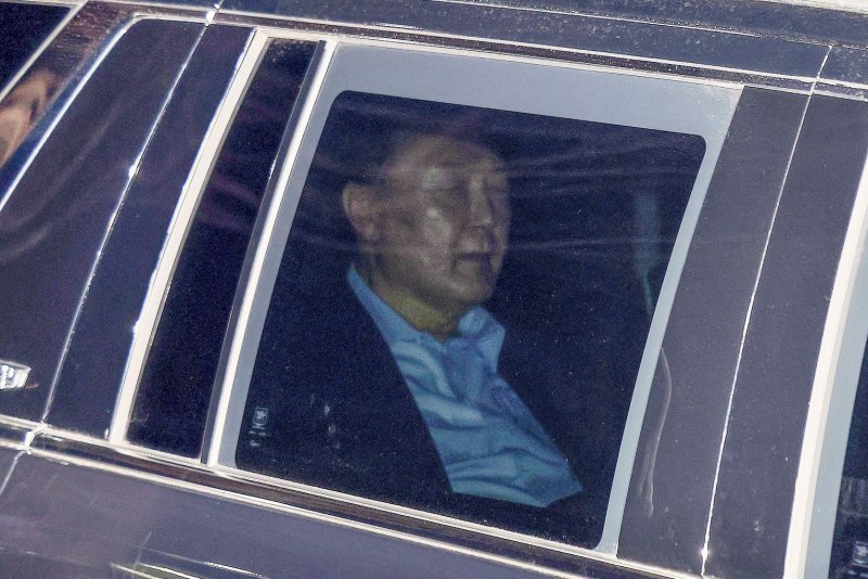 South Korean court issues warrant to detain Yoon for extended period over martial law bid