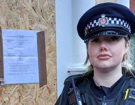 Police officers close down property in Royal Pier Road, Gravesend, during crackdown on anti-social behaviour