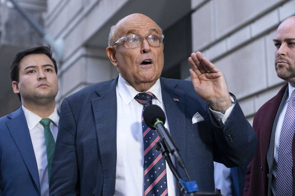 Giuliani settles dispute with Georgia election workers