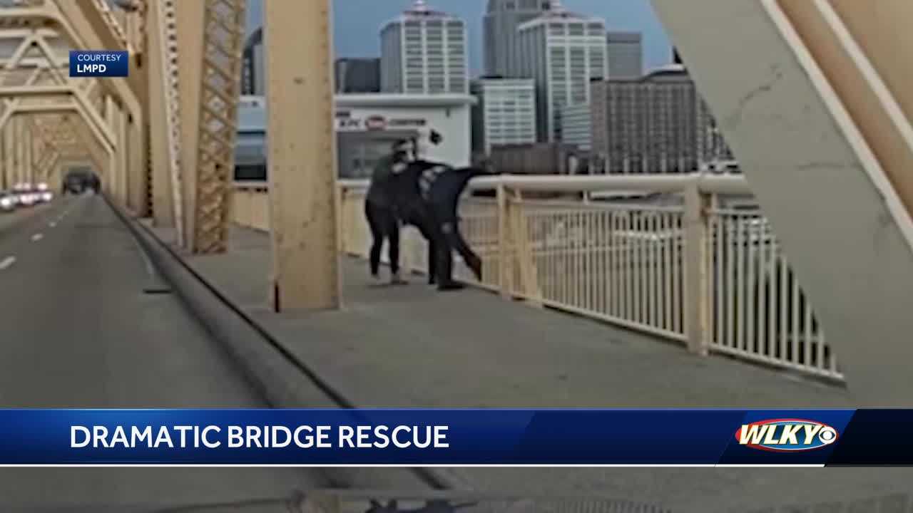 Officer praises woman for saving man from jumping off Clark Memorial Bridge