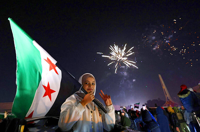 Syrians celebrate al-Assad’s absense - Taipei Times