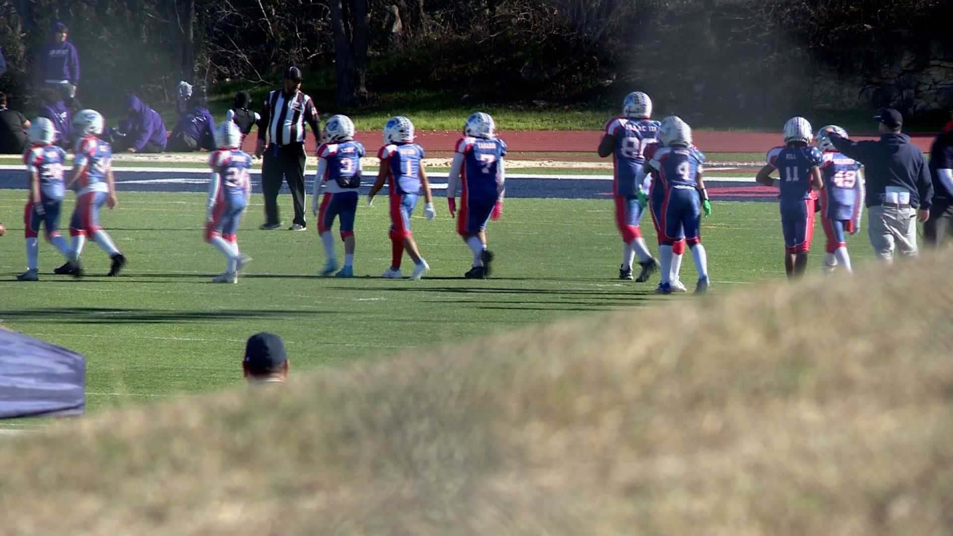 Youth football game interrupted by hatchet-wielding man