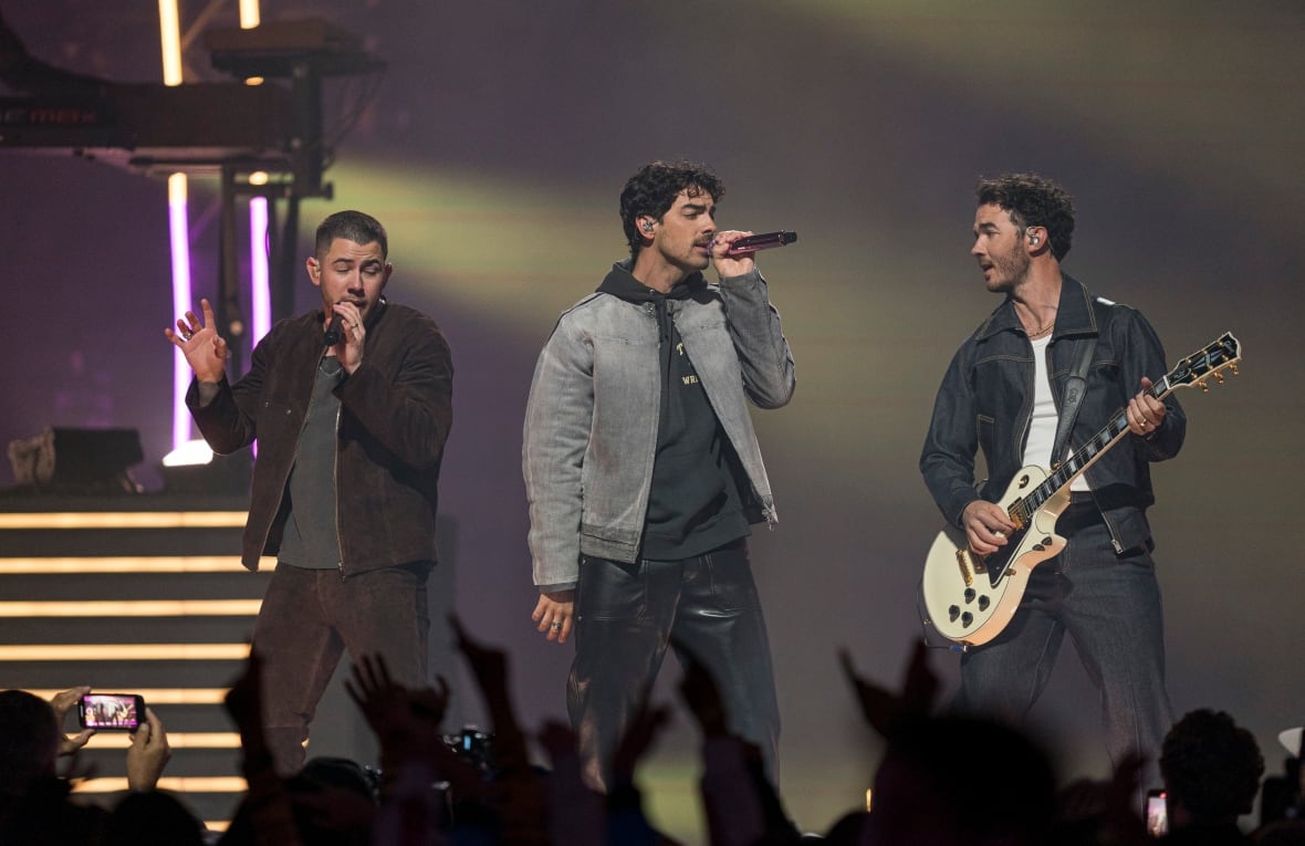 Jonas Brothers show up at Camp Rock movie trivia in Toronto, eliciting screams and swoons