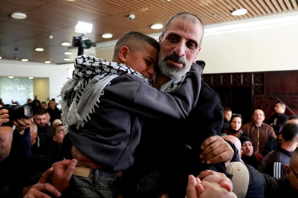 Three Israeli hostages and hundreds of Palestinian prisoners freed as ceasefire holds