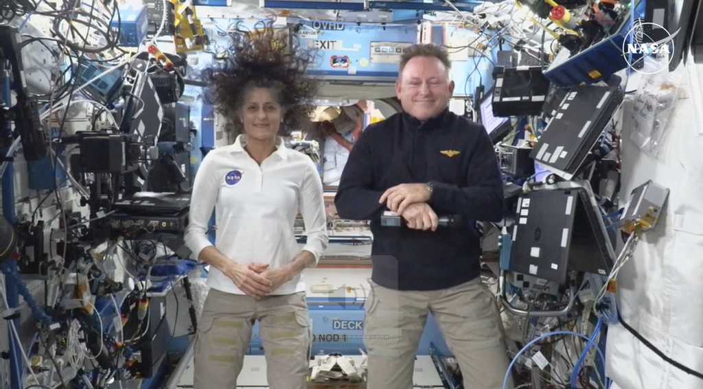 NASA plans early return for two stuck astronauts