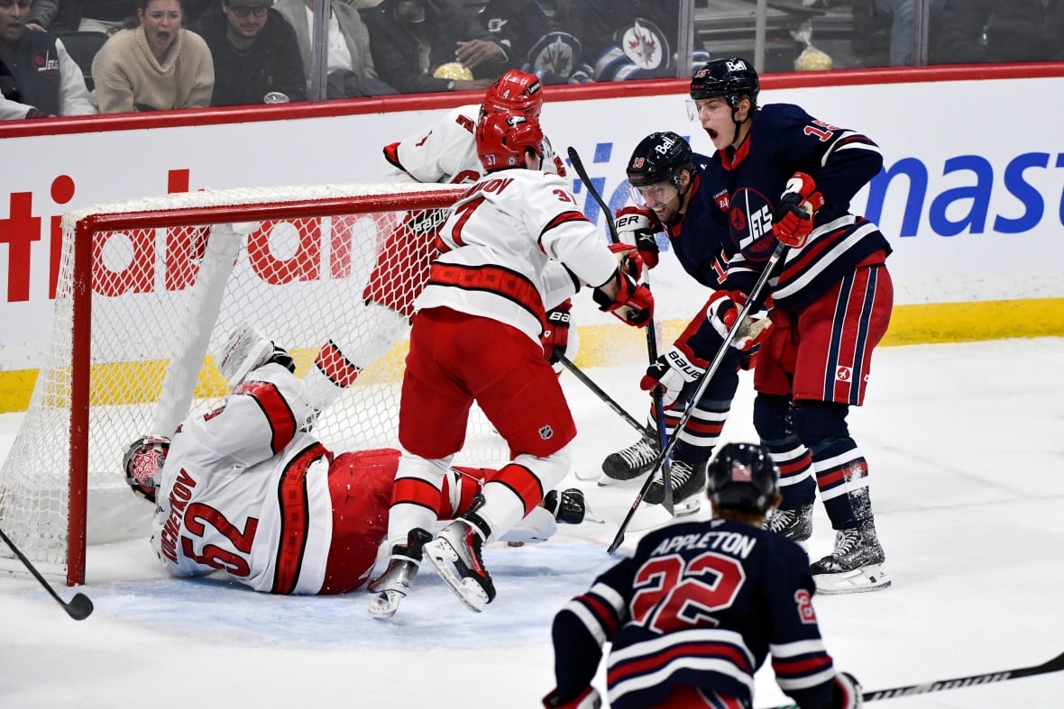 Comrie shuts out Carolina as Jets beat Hurricanes 3-0 for 7th straight win